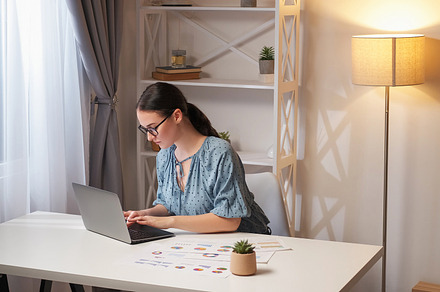 Online job statistics analysis woman working home, a Person Photo by Photo Drive Studio