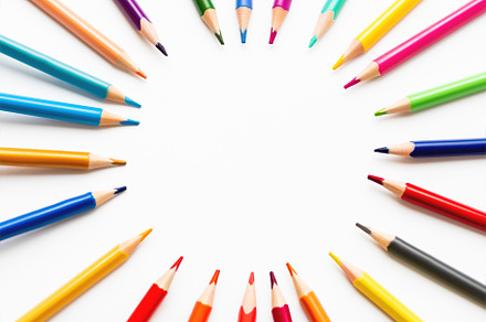 Colorful pencils circle copy space containing pencil, stationery, and crayon