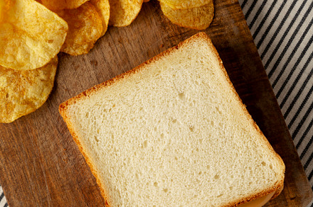 Homemade American Peanut Butter Sandwich on a Wooden Board, top