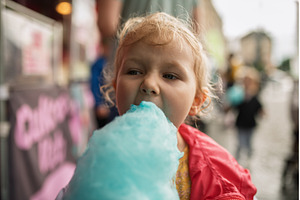 Cute kid eating cotton candy, a Nature Photo by HalfPoint