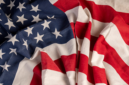 part of the American flag with stars and red and white stripes, a Photo by MyPhotos