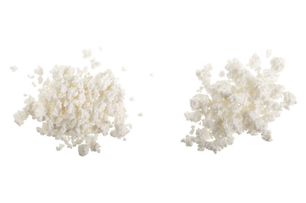 Cottage cheese isolated on white, a Food & Drink Photo by NataPhoto