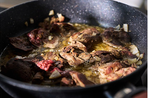Cooking liver pieces in a frying pan, a Food & Drink Photo by darksoul72