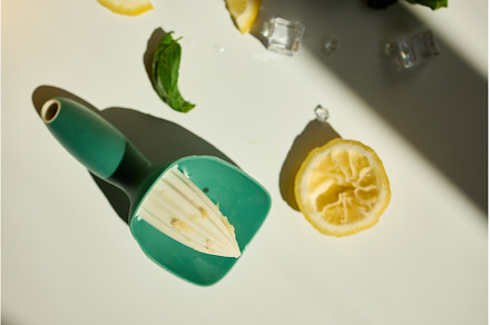 Lemon slices and scoop on a bright