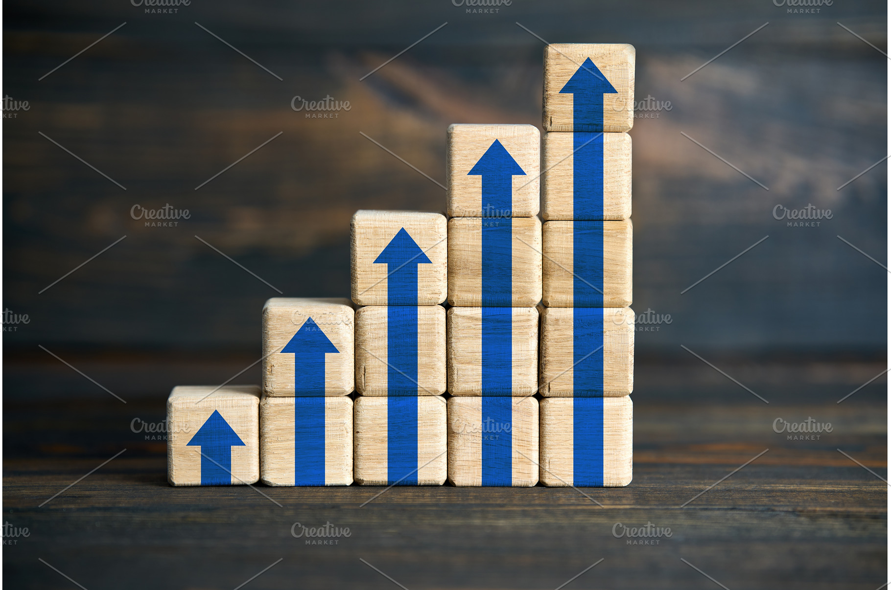 Wooden blocks stacked as blue arrow, a Business Photo by Gladkov photography