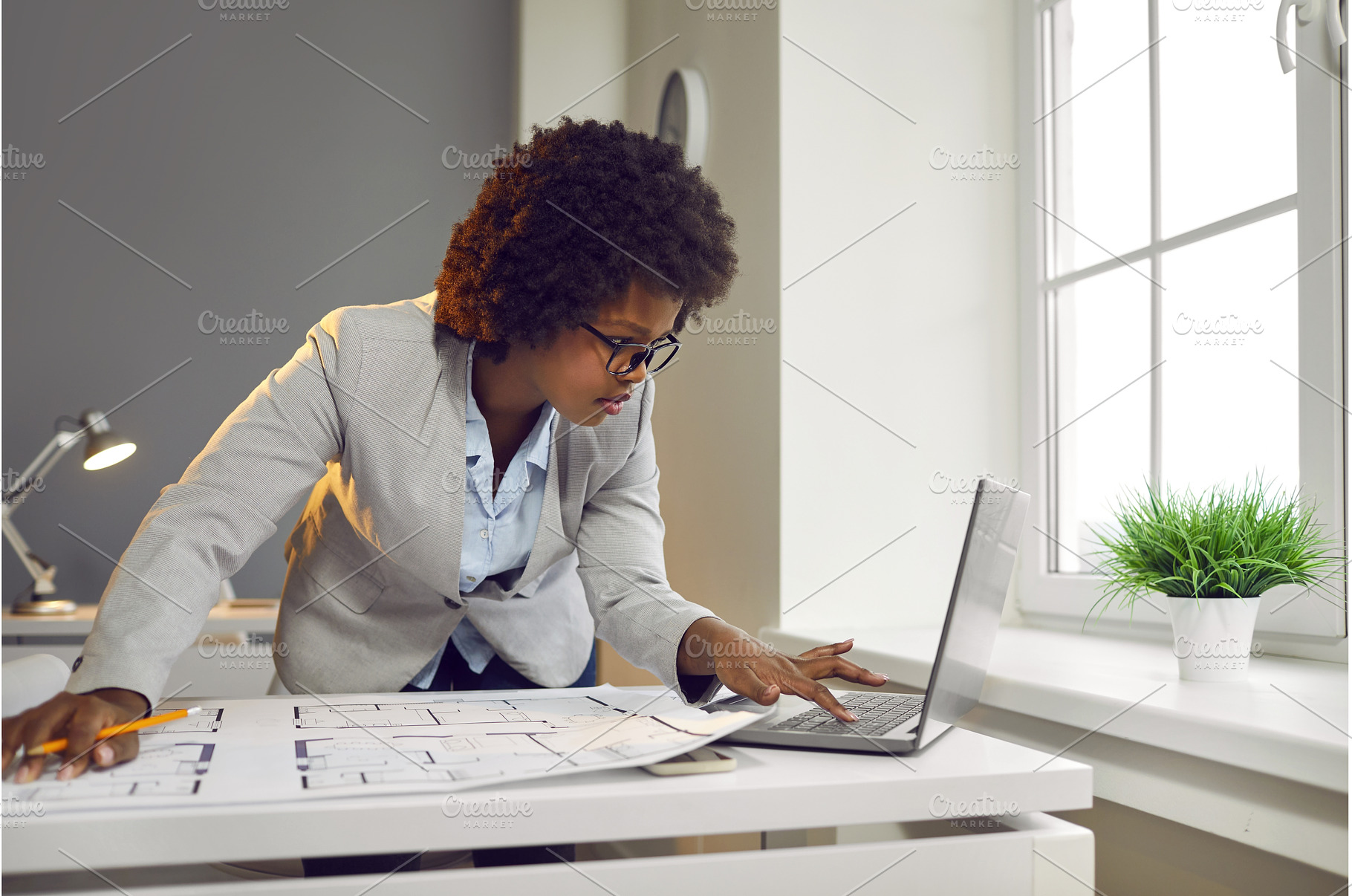 Young interior designer woman, a Business Photo by StudioRomantic