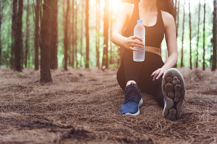 Close up of beauty sport woman resting and holding drinking wate, a Sports & Recreation Photo by Ministocker