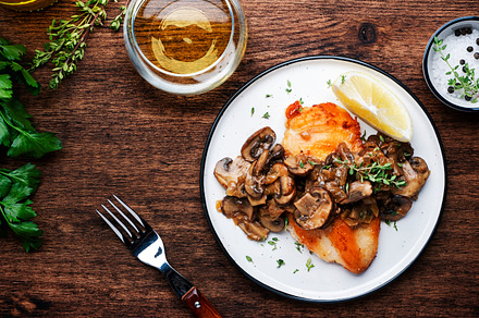 Fried chicken breast fillet with champignon mushrooms and onion, a Food & Drink Photo by 5PH