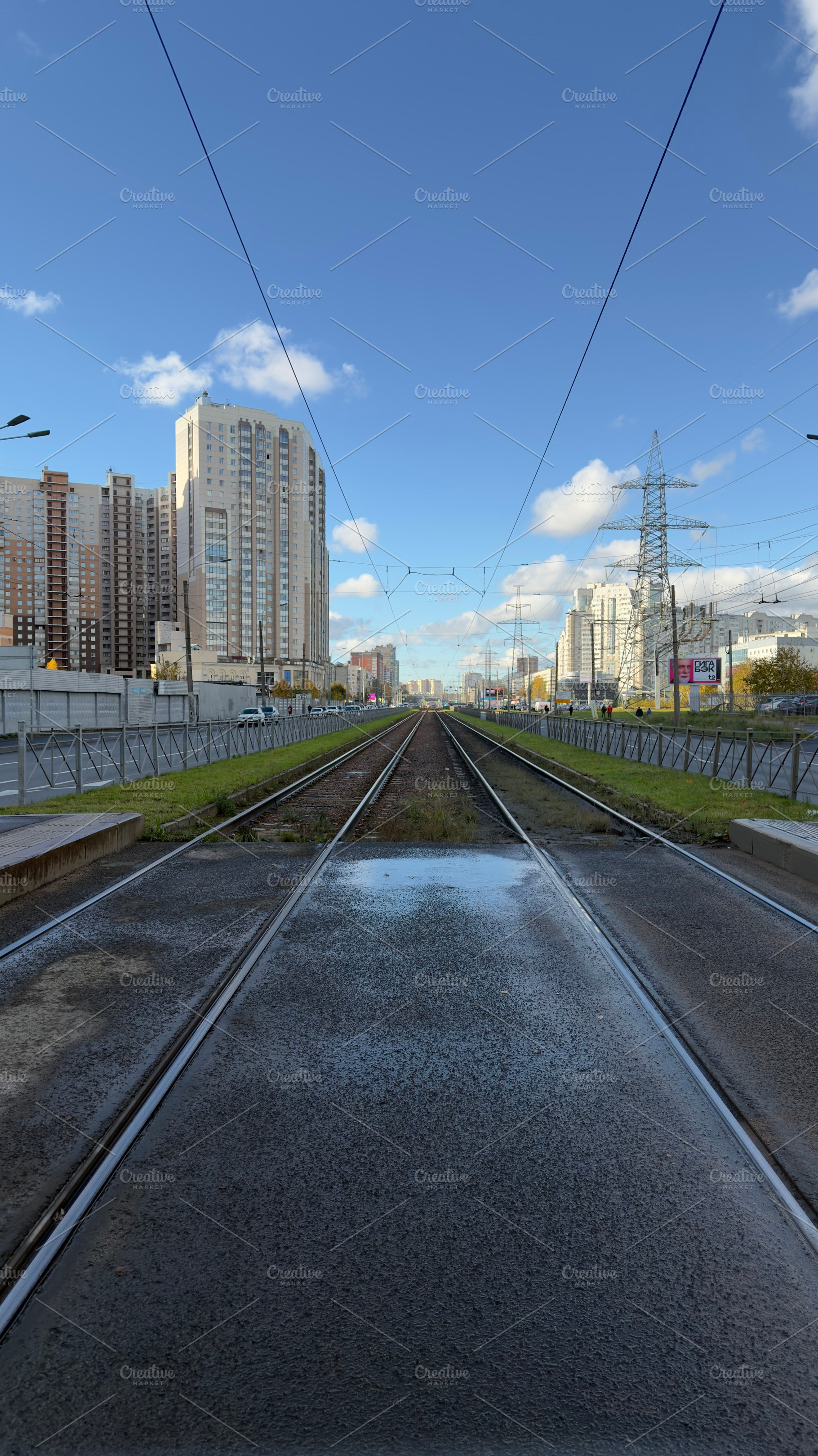 A view of railway tracks stretching into the distance, flanked by modern buildi, an Industrial Photo by Textures & Backgrounds