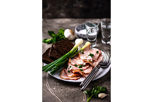 Sliced boiled smoked pork or ham, a Food & Drink Photo by Yulia Furman