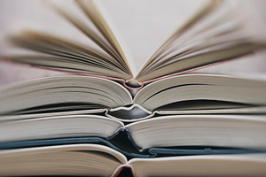 Several textbooks with white sheets stock photo containing book and open