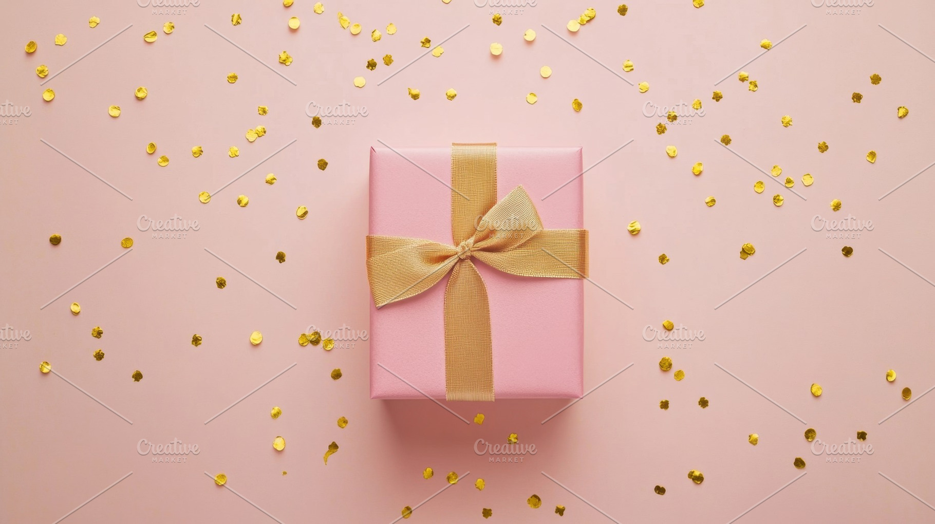 Gift box with gold confetti, a Photo by Beautiful things