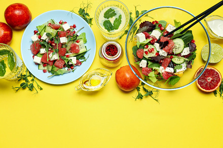 Concept of tasty food, salad with red orange, space for text, a Food & Drink Photo by AtlasStudio