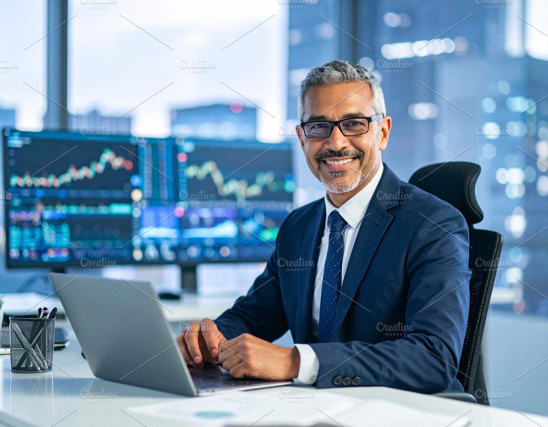Man sitting in a modern home office with digital charts blurred, a Photo by DanFLCreativo
