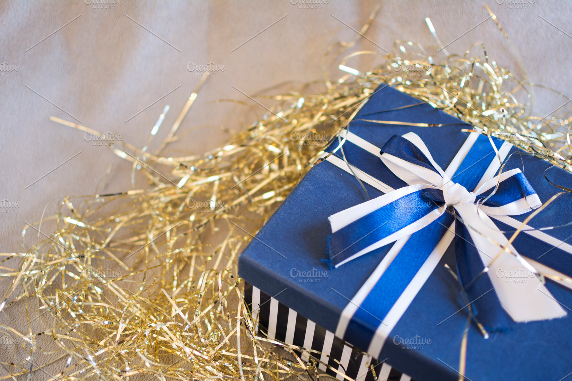 Blue Christmas gift box, a Holiday Photo by RaquelVizcaíno