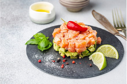 Salmon salad, tartare, a Food & Drink Photo by piter.goskov