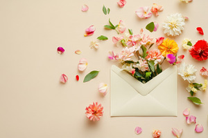 Flowers and an envelope, a Photo by Beautiful things