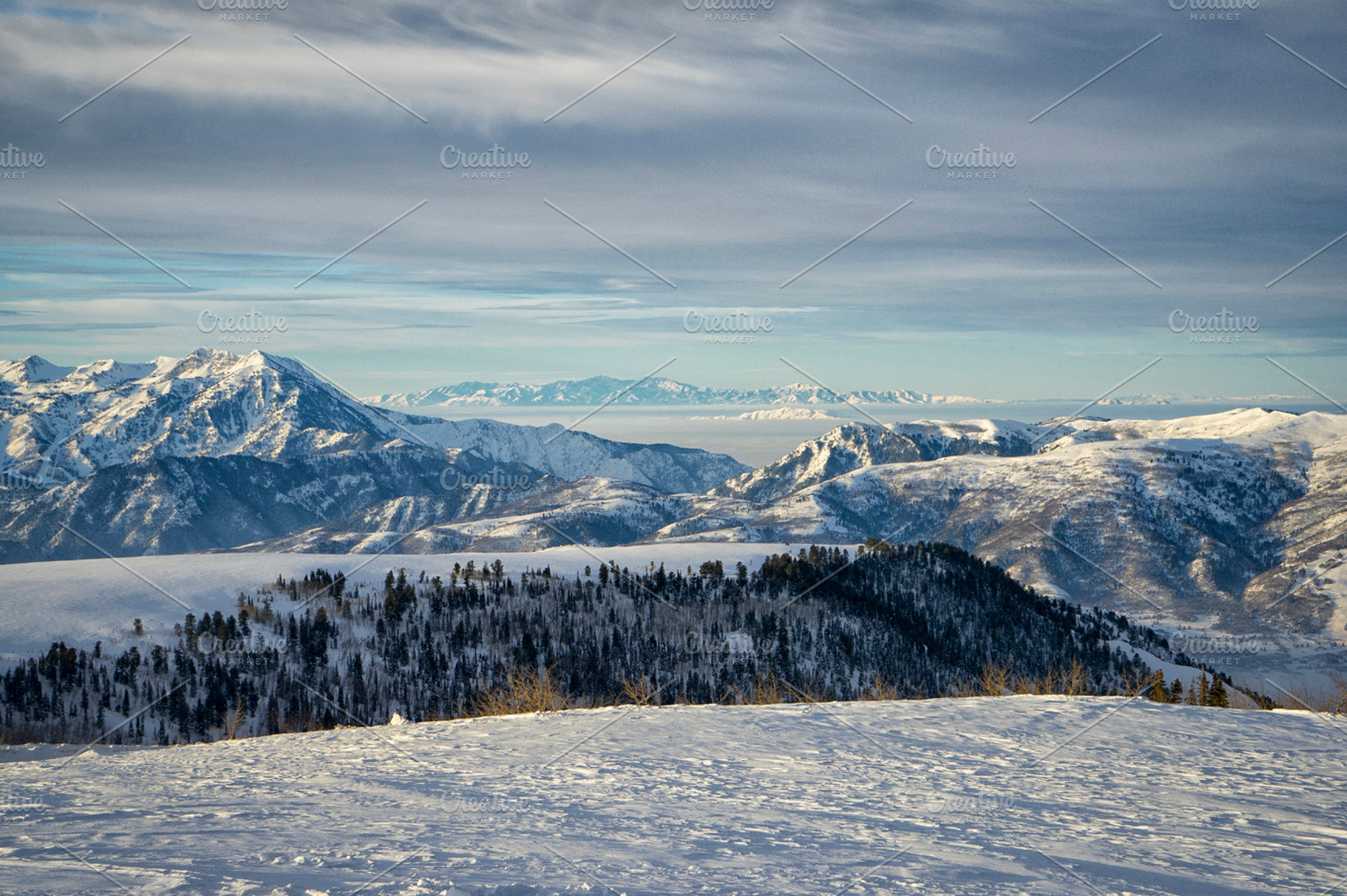 Snow capped mountains stock photo containing mountains and valley, a Nature Photo by The Native Lens