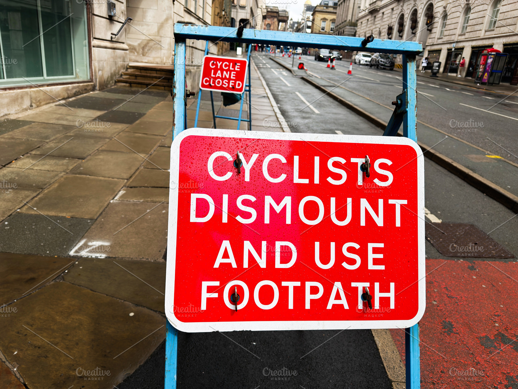 Cyclists dismount and use footpath red road sign directing pedes, a Photo by AS photostudio