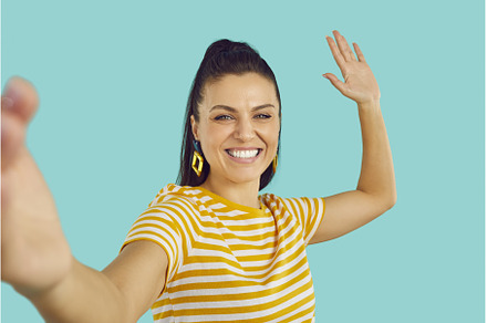 Joyful female blogger taking selfie, a Person Photo by StudioRomantic