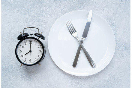 Intermitted farsting diet concept, a Food & Drink Photo by Neirfy