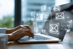 Person checks emails at desk, a Photo by Beautiful things