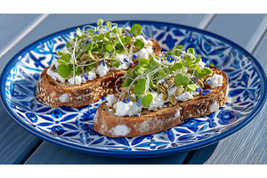 A wooden background features bread, a Food & Drink Photo by ZinetroN