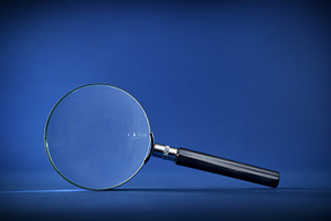 Magnifying Glass on Blue Background, a Business Photo by Davizro's Market