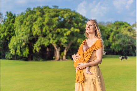 Mother holding her little baby in a
