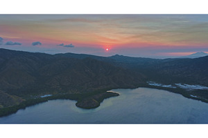 Sunset illuminating Komodo national, a Nature Photo by Goinyk