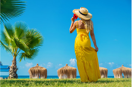 Woman on vacation at sea. Selective, a Person Photo by yanadjana