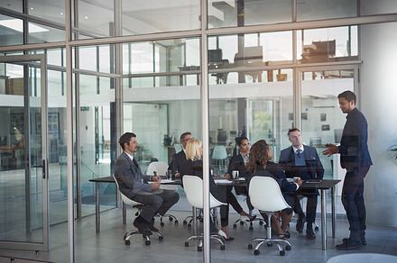 The whole team together for a meeting, a Photo by Peopleimages.com