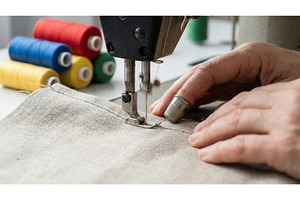Man Sewed for Work, an Industrial Photo by CREATIVEDEF