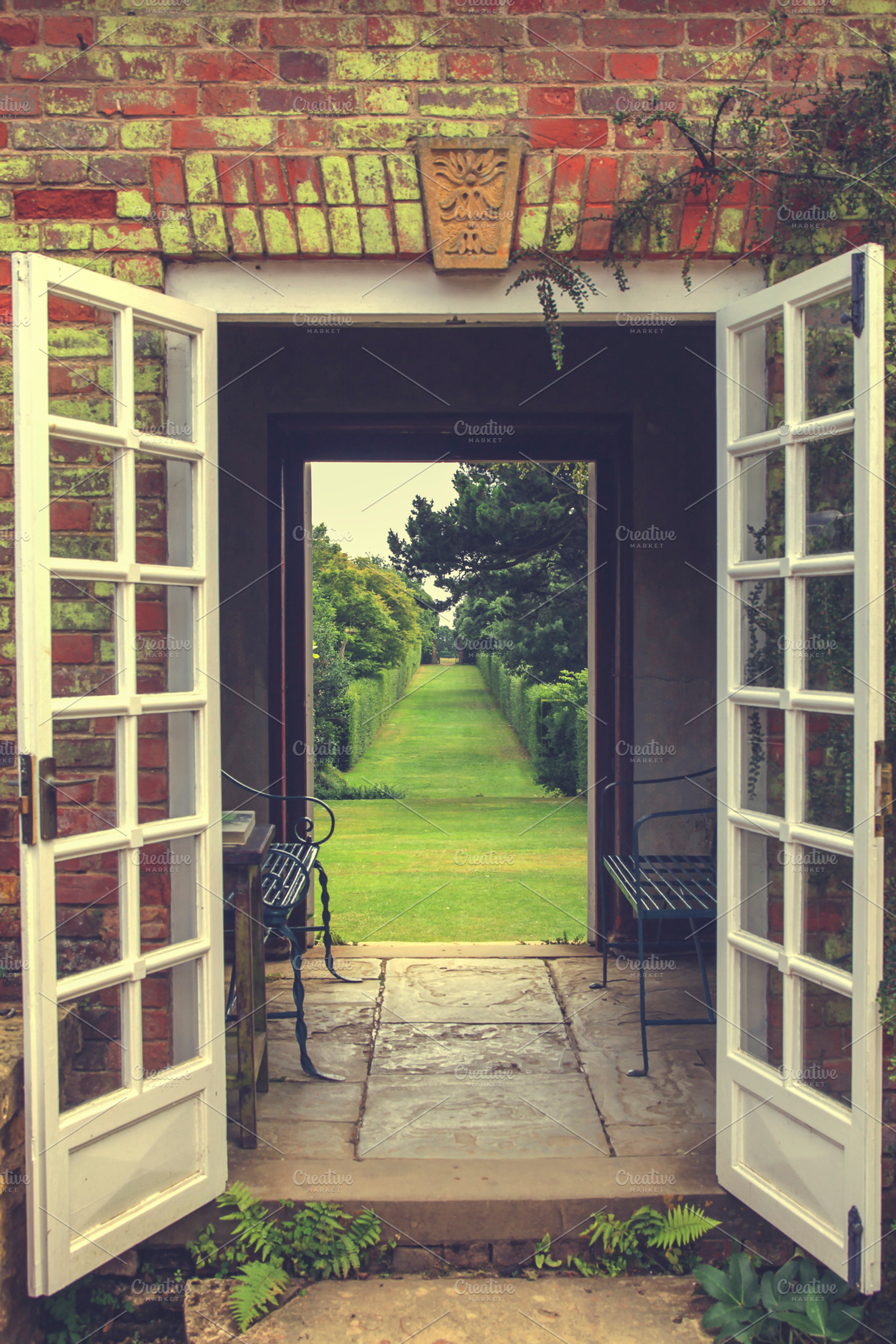 English garden featuring doors, open, and garden, an Architecture Photo by Patricia Hofmeester