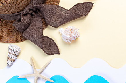 Summer holidays background with hat, sunglasses and seashells, waves made from, a Holiday Photo by iuliia_n