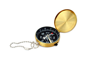 Golden compass isolated, a Photo by saiko3p