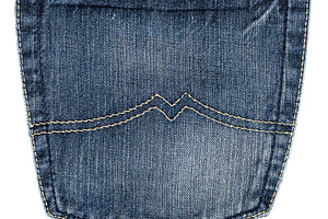 Back pocket of blue jeans with contrast stitching and leather in, a Beauty & Fashion Photo by ndanko