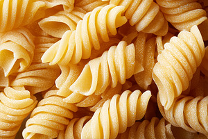 Uncooked fusilli pasta with spiraled, a Food & Drink Photo by MistyDay