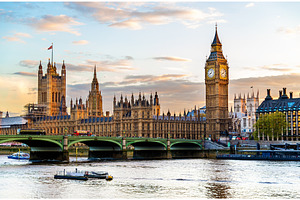 The palace of westminster in london in the evening england containing, an Architecture Photo by Leonid Andronov