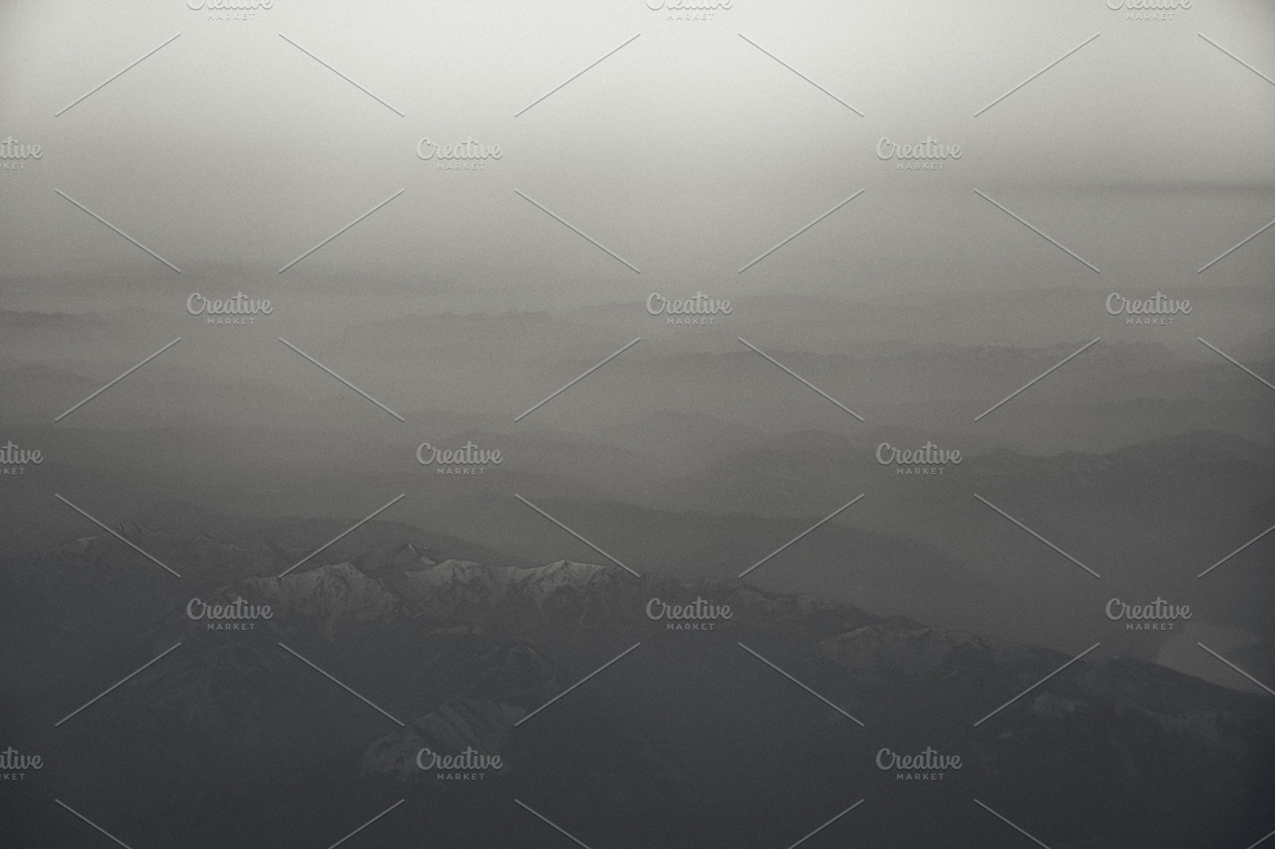 Mountains from above featuring mountain, mountain range, and above, a Nature Photo by Matt Jones
