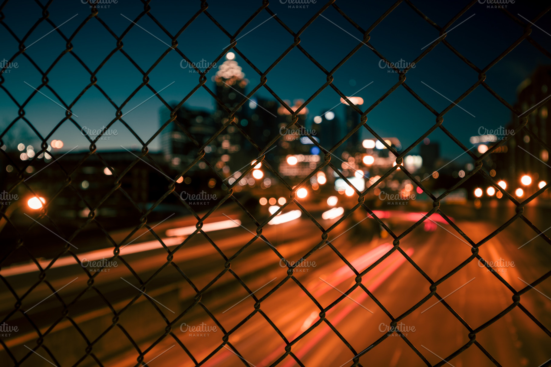 City skyline through the wire mesh containing abstract, architecture, and, an Architecture Photo by khoroshkov