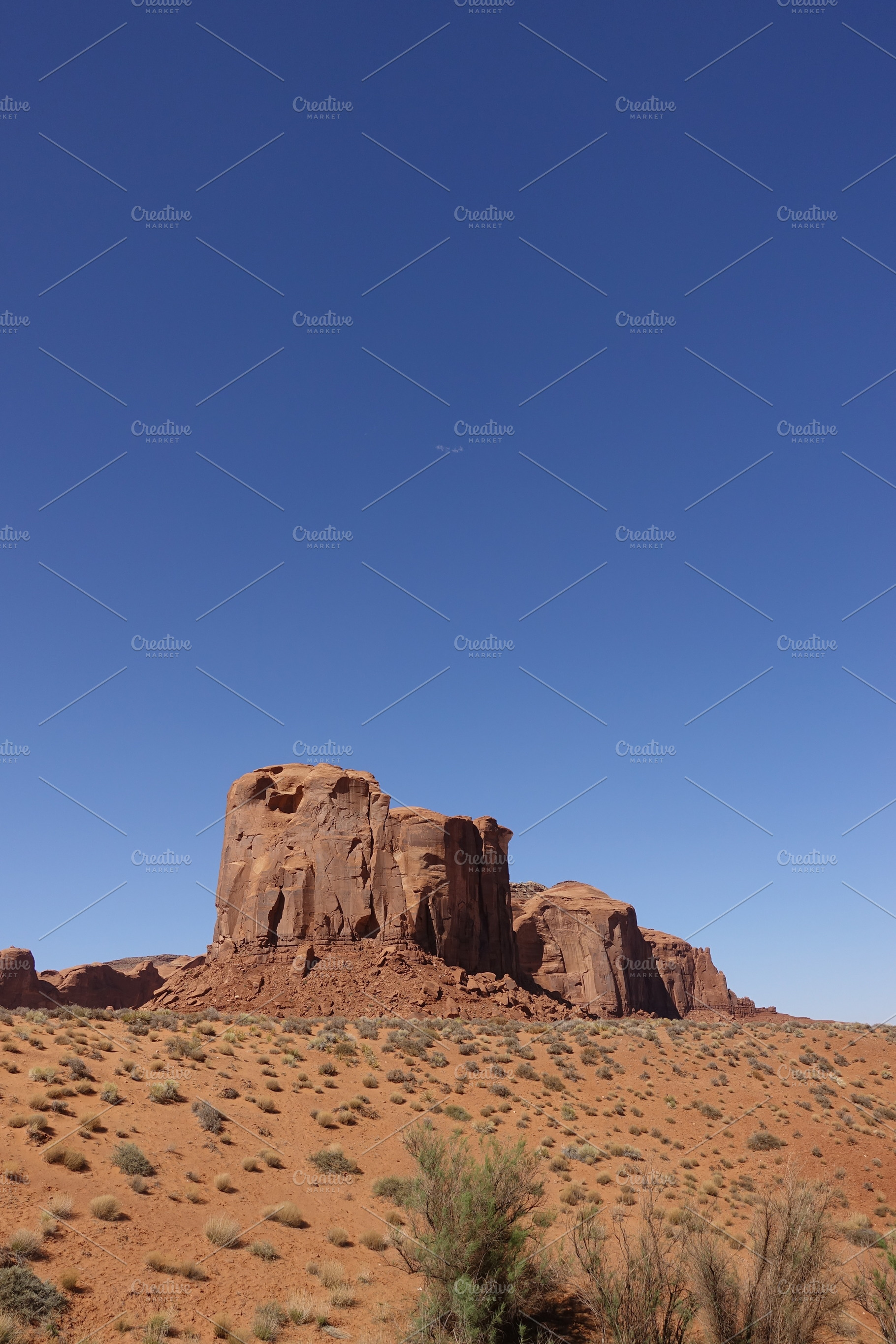 Standing rocks in desert containing utah, nature, and desert, a Nature Photo by The Greenawalt's