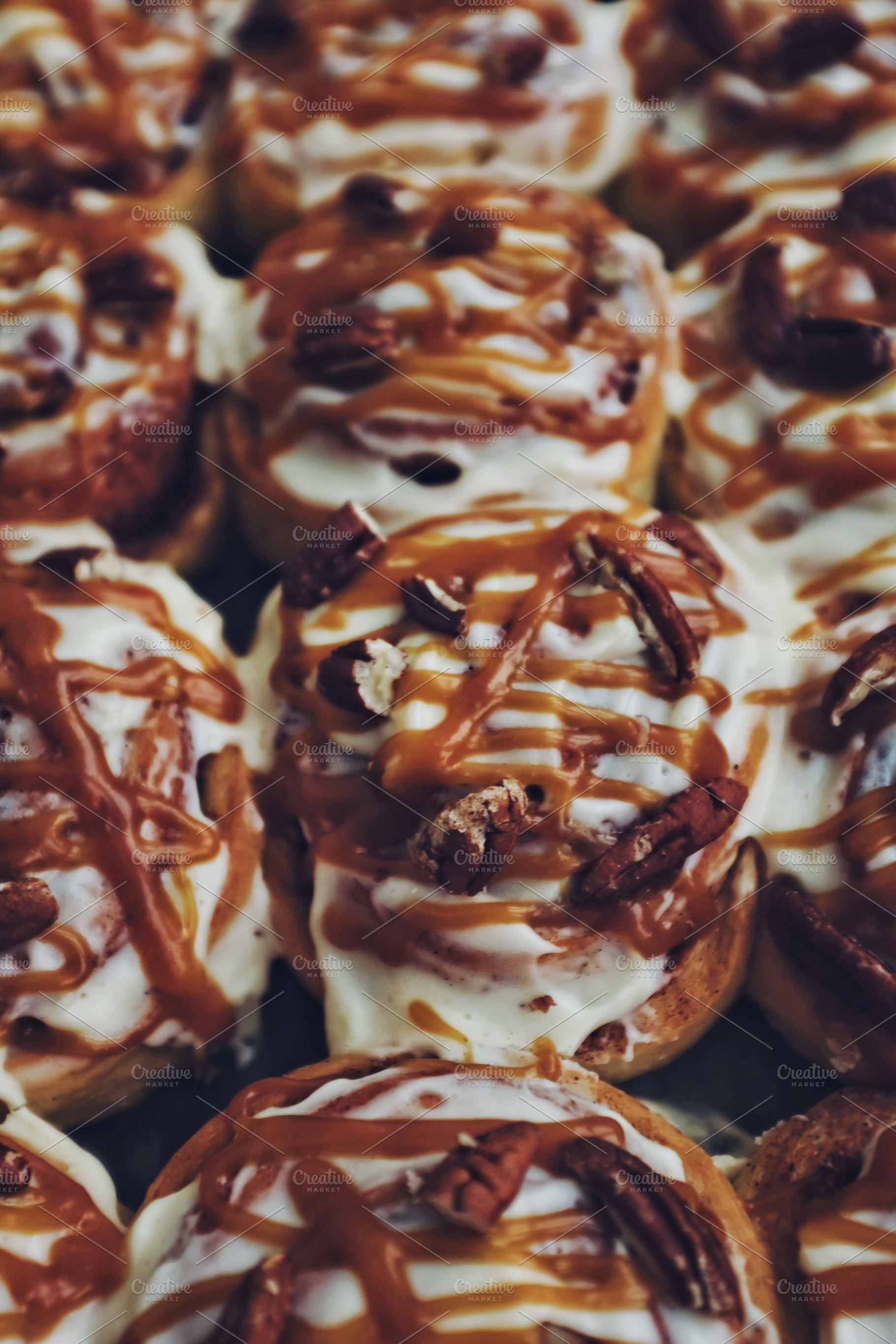 Cinnamon rolls containing cinnamon, pecan, and buns, a Food & Drink Photo by so_lizaveta
