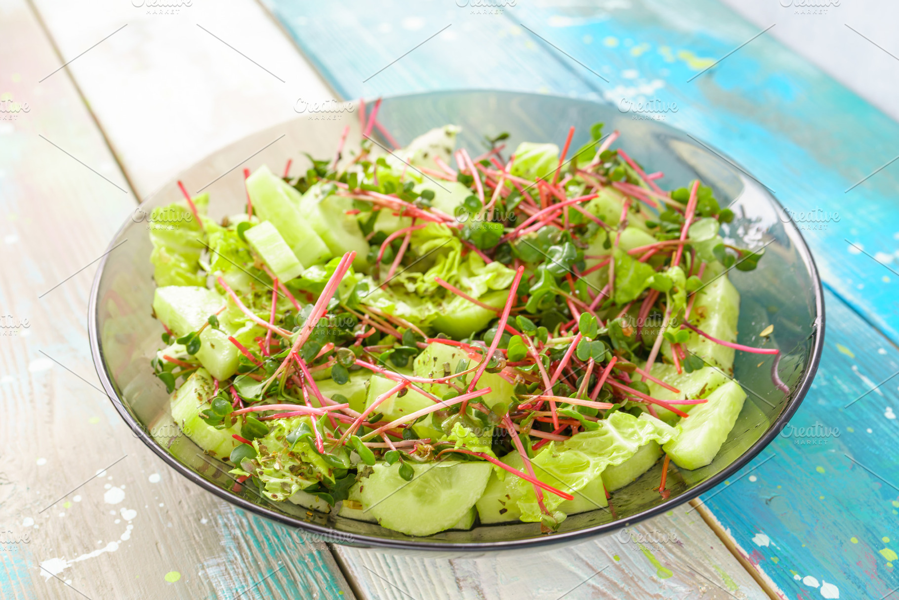 Fresh green salad with red radish microgreens and vegetable mix. Healthy food a, a Food & Drink Photo by Eugene_Photo