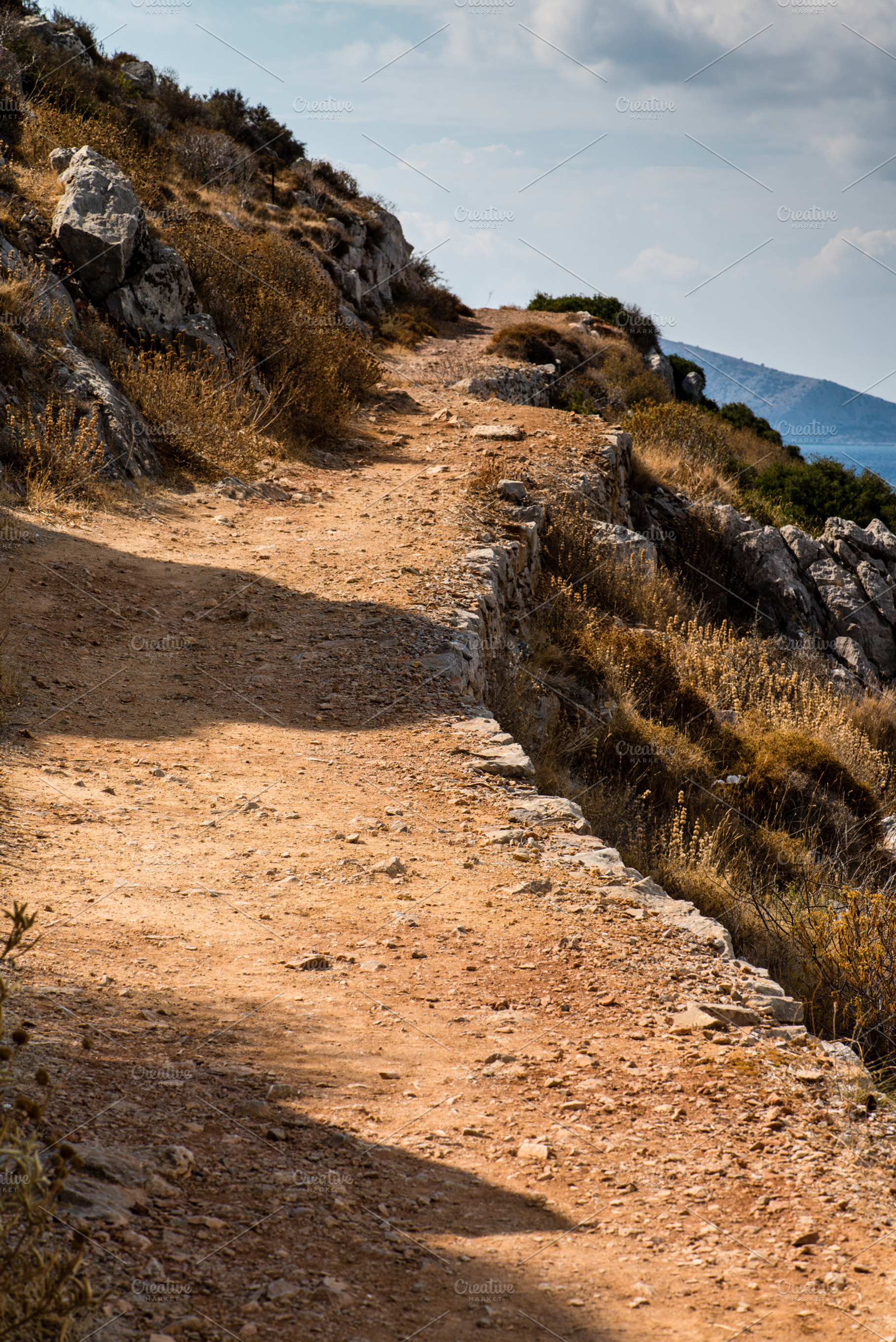Path Containing Rock Cliff And Path