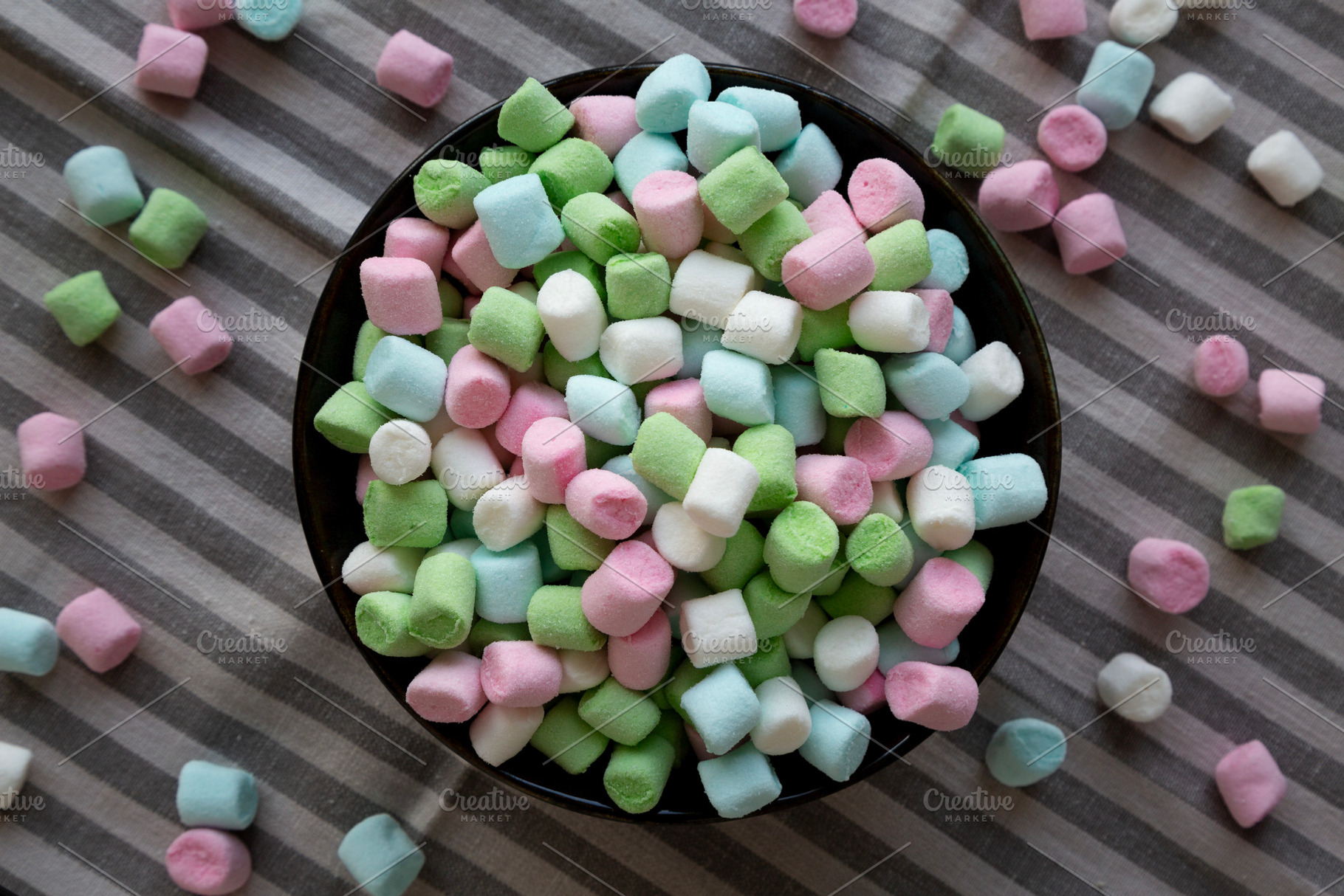 Fruity Colored Rainbow Marshmallows in a Bowl, top view., a Food & Drink Photo by LiudmylaChuhunova