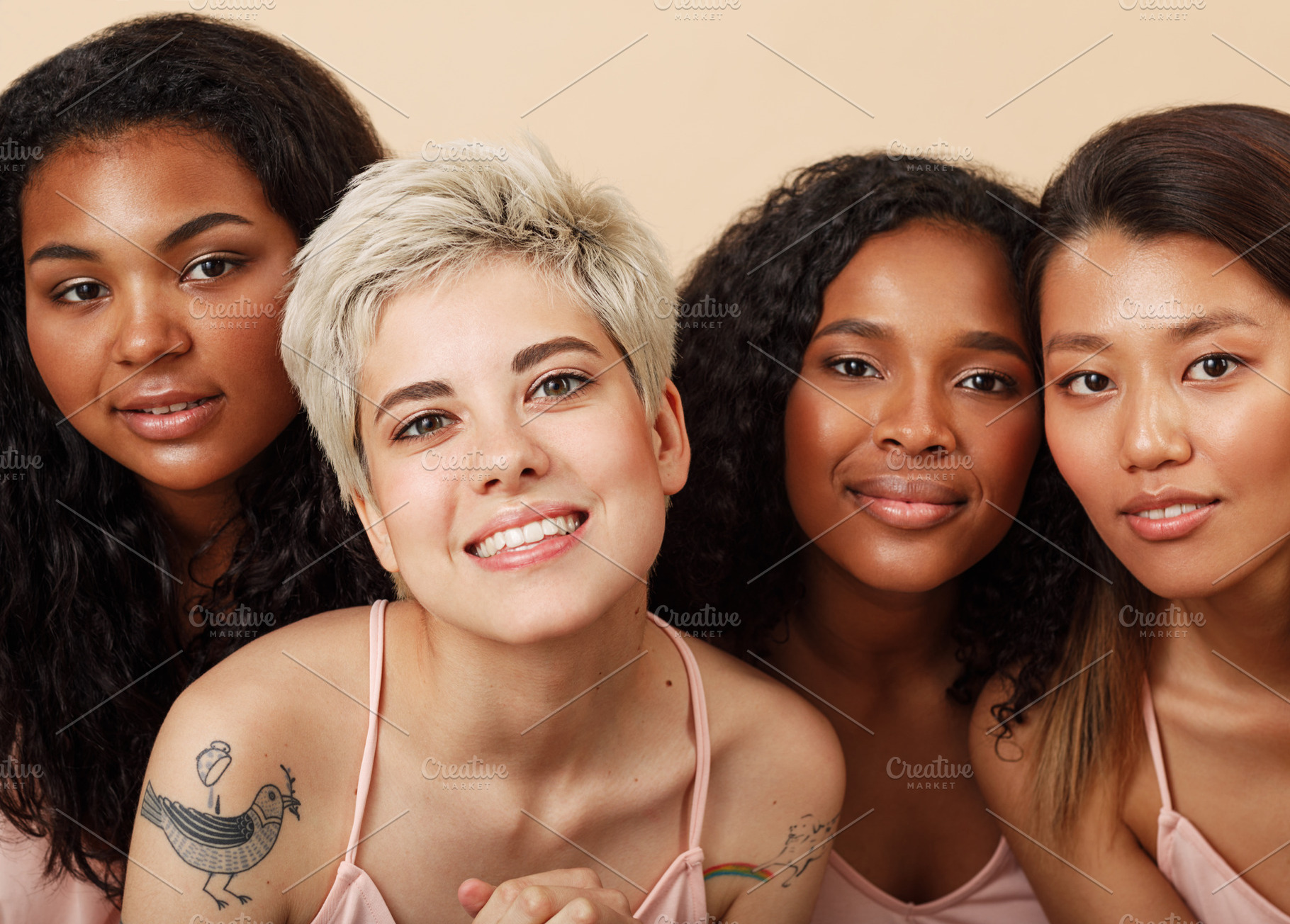 Group portrait of four diverse women, a Person Photo by Artem Varnitsin