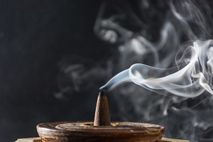 Various incenses on black background featuring abstract, aroma, and