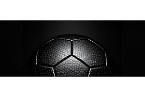A black textured soccer ball under, a Technology Photo by Igor Tichonow