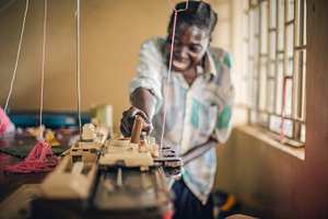 Ugandan Worker Woman Sewing